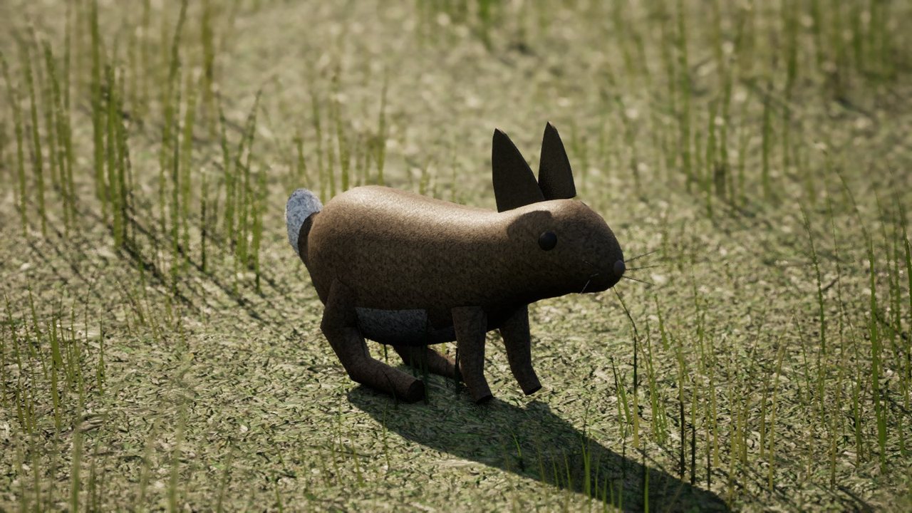 A brown rabbit with tall ears and a white tail sitting in grass by the hedgerow.