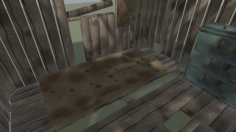 Inside a battered wooden shack: a stained mattress lies on a floor of loose, gappy planks, with daylight showing between the wall boards and through a broken window. A flaking blue-green chest of drawers stands on the right.