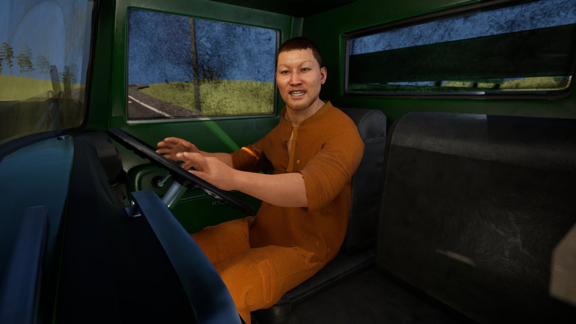 A young man in orange council overalls at the wheel of a green lorry cab, grimy windows behind him and a country road outside, turning to talk to his passenger.